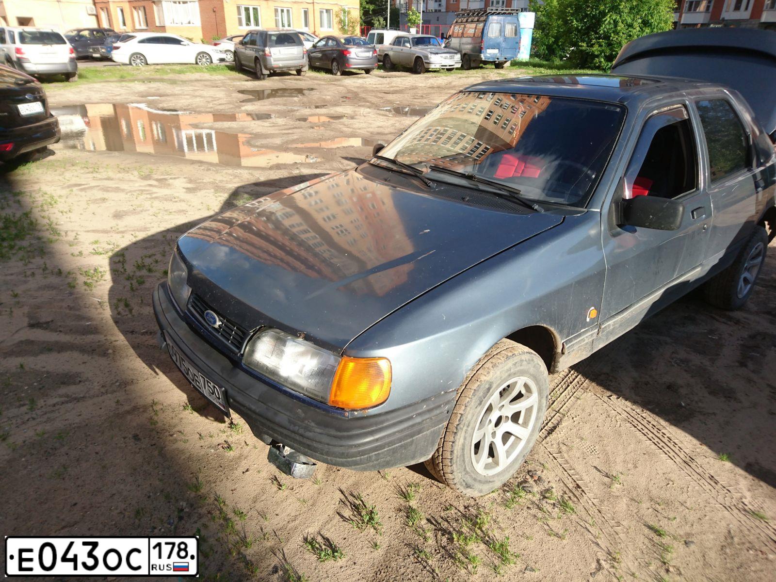 Фото автомобиля FORD FOCUS, 2010 — госномер Е043ОС178. Цвет: ЧЕРНЫЙ