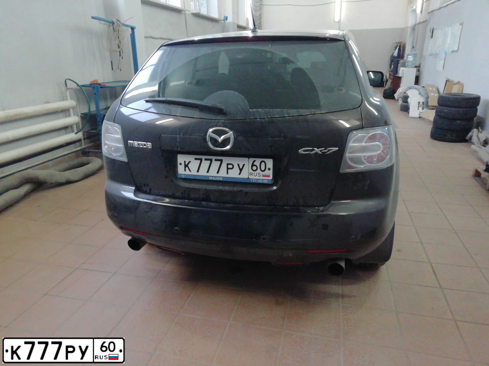 Фото автомобиля MAZDA CX-7, 2008 — госномер К777РУ60. Цвет: ВИШНЕВЫЙ ТЕМНЫЙ