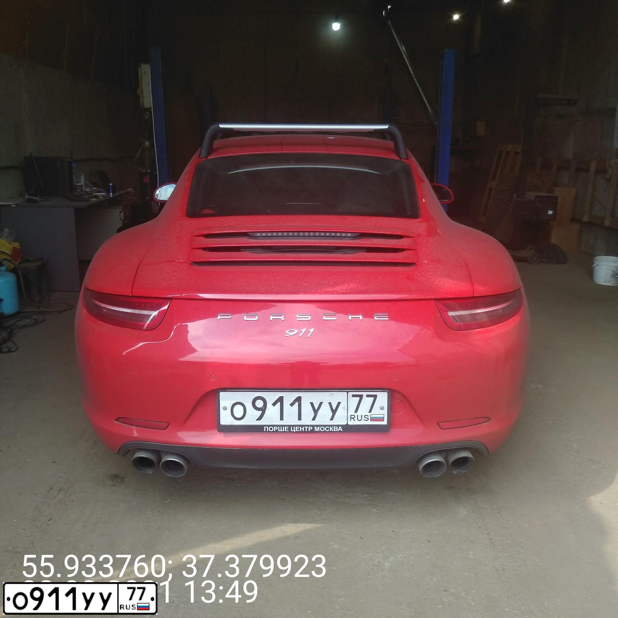 Фото автомобиля PORSCHE 911 CARRERA, 2013 — госномер О911УУ77. Цвет: КРАСНЫЙ