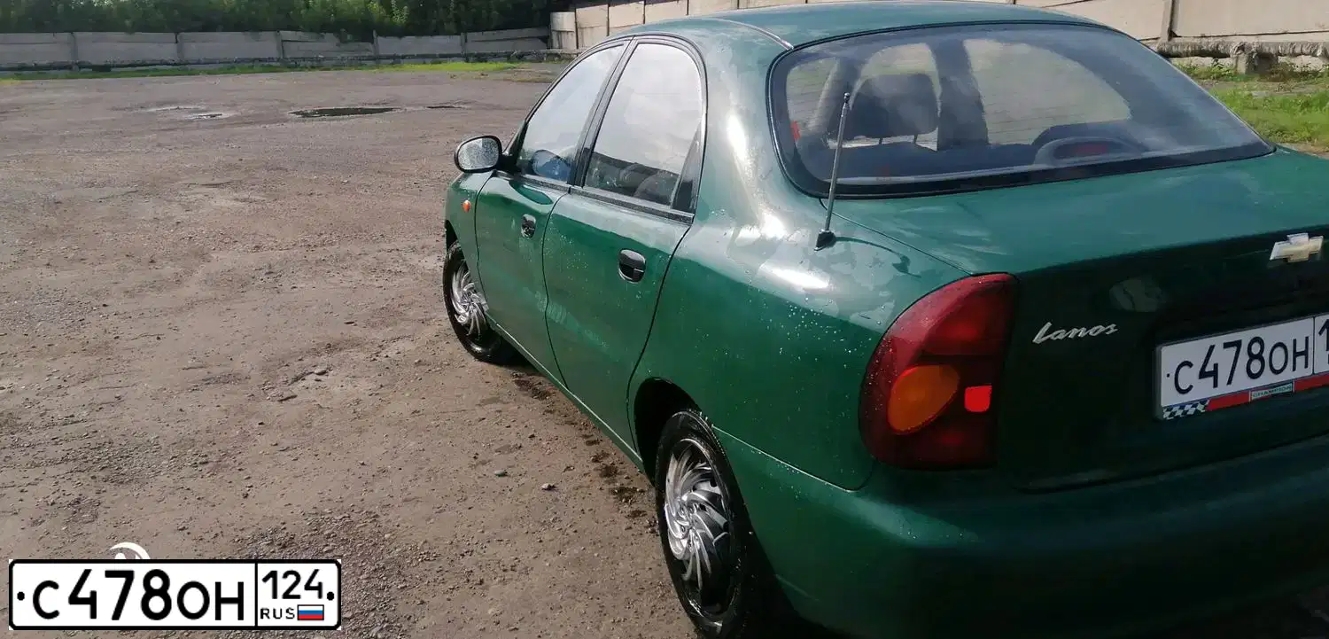 Фото автомобиля LADA 2112, 2005 — госномер Н075ММ124. Цвет: ЗЕЛЕНЫЙ