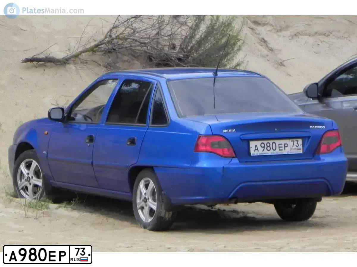 Фото автомобиля DAEWOO NEXIA, 2011 — госномер А980ЕР73. Цвет: сине-глазуристый