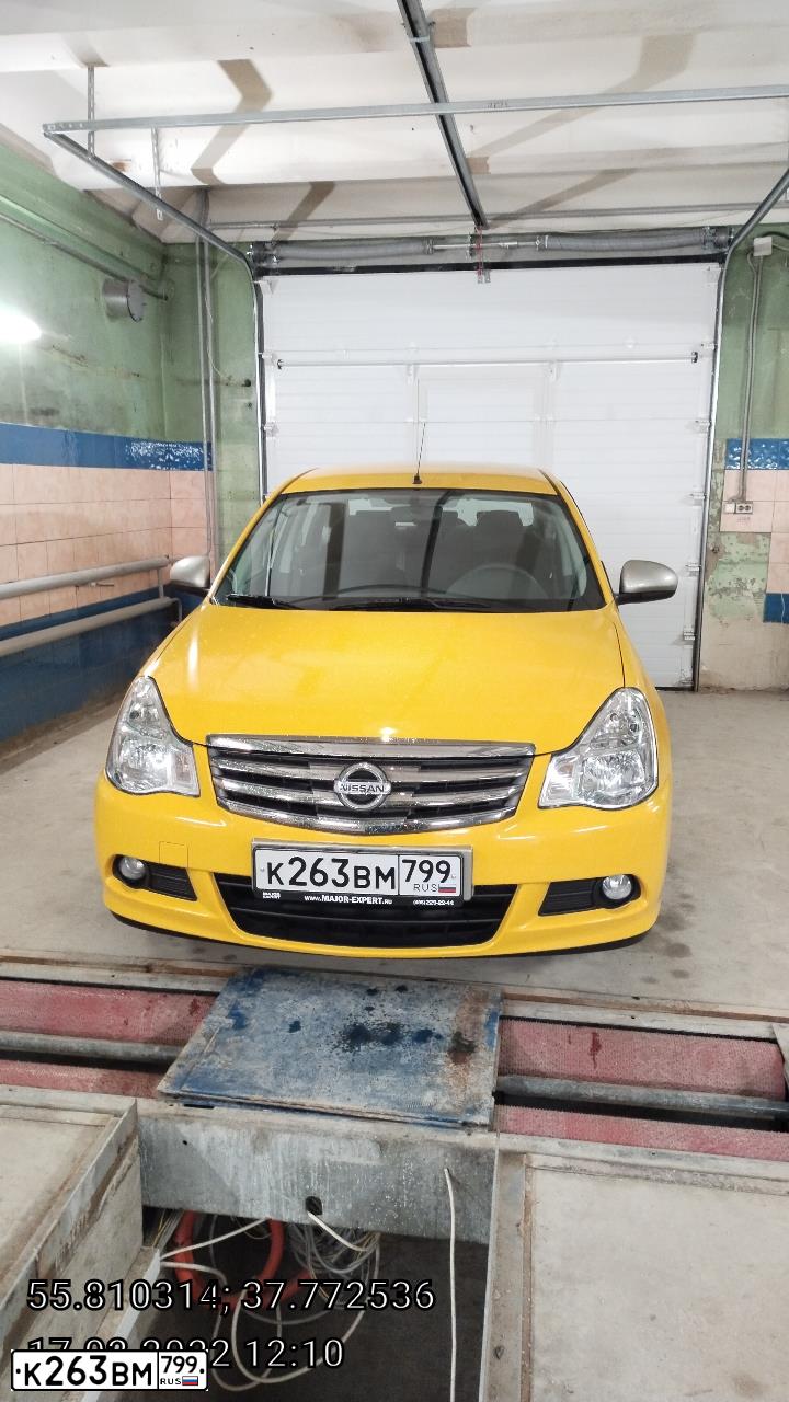 Фото автомобиля NISSAN ALMERA /AVTOVAZ/, 2017 — госномер К263ВМ799. Цвет: ЖЕЛТЫЙ