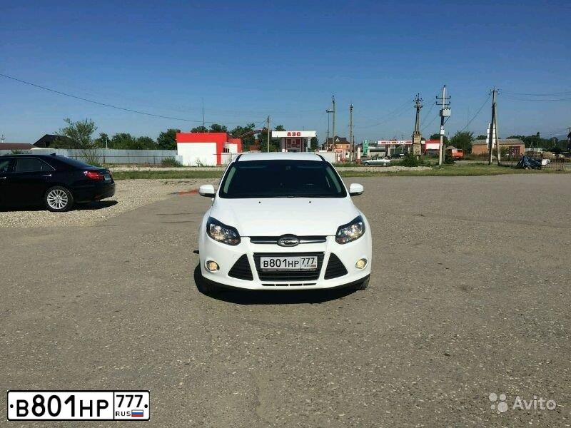 Фото автомобиля FORD FOCUS, 2012 — госномер Е583ТХ95. Цвет: Белый