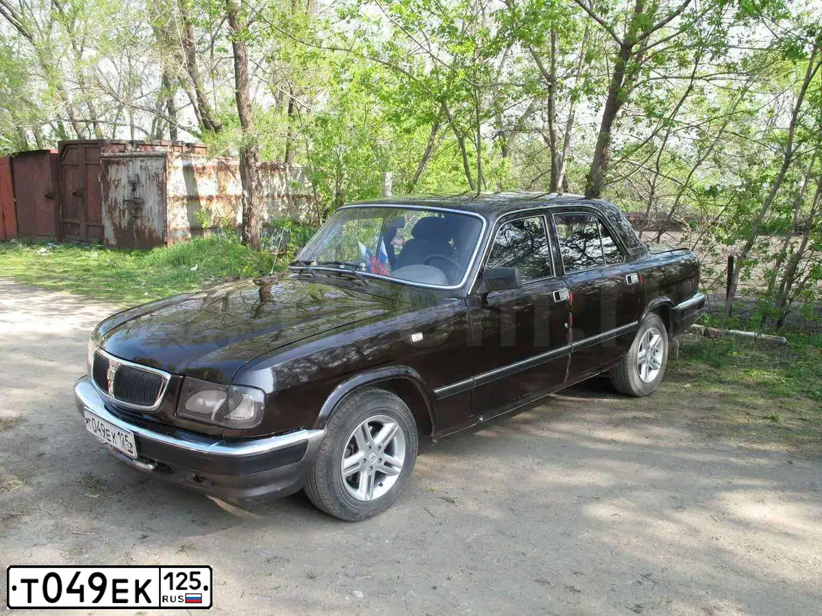 Фото автомобиля GAZ 3110 WOLGA, 2001 — госномер К617УТ28. Цвет: Коричневый