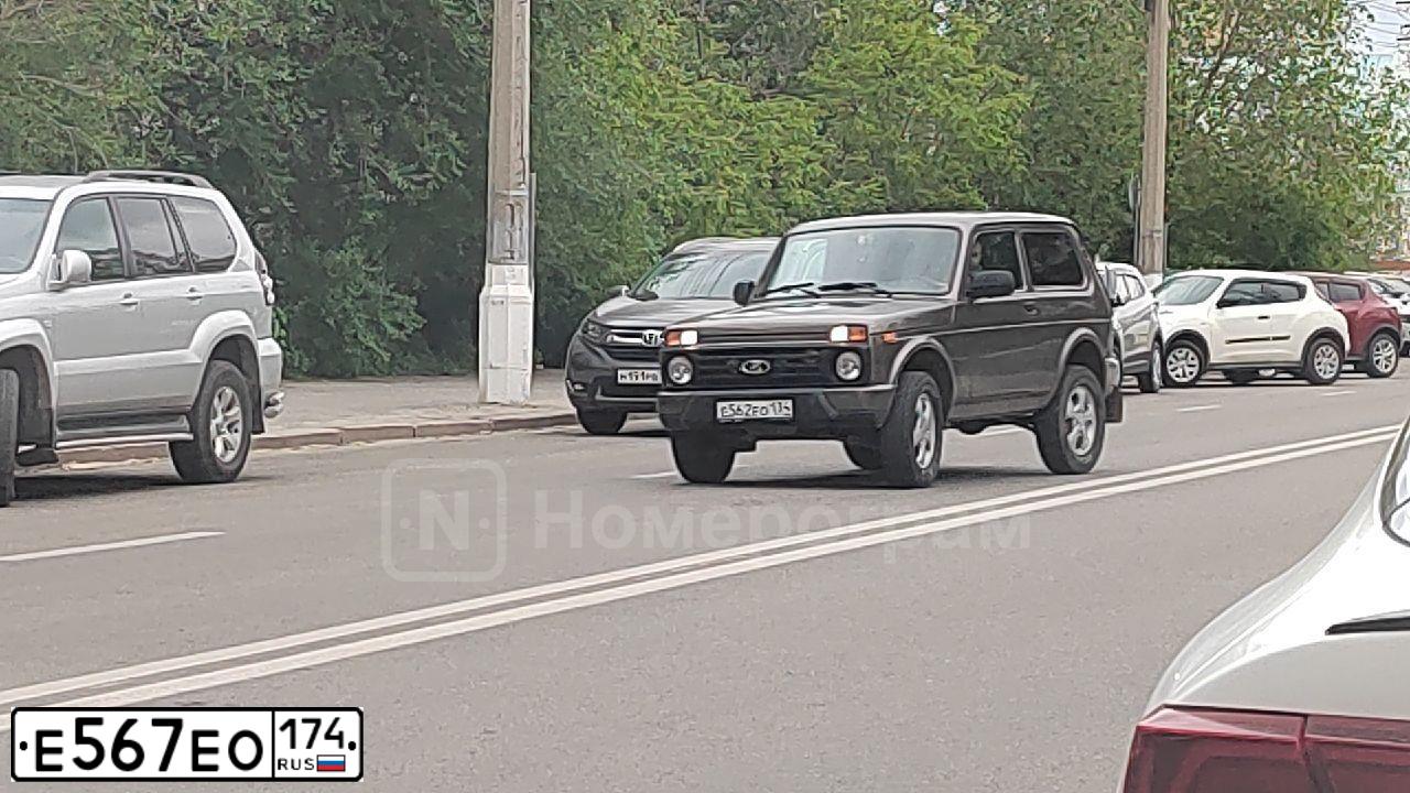 Фото автомобиля VAZ ВАЗ21124, 2006 — госномер Е567ЕО174. Цвет: ЧЕРНЫЙ