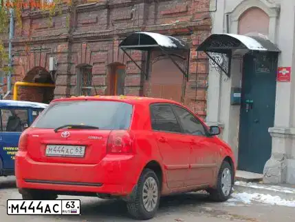 Фото автомобиля TOYOTA COROLLA, 2006 — госномер Е316АУ154. Цвет: Красный