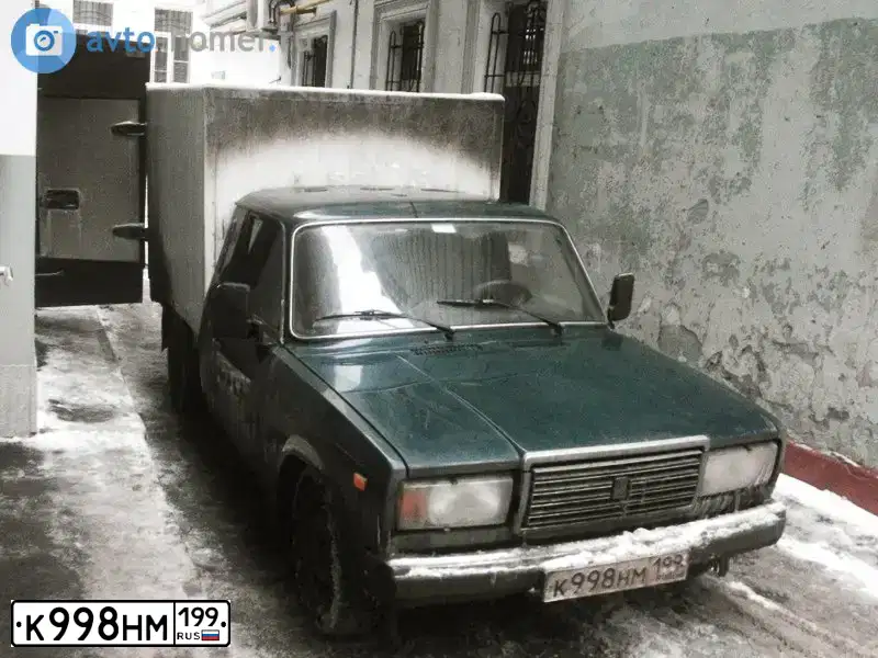 Фото автомобиля LADA 2345 WIS, 2008 — госномер Н784ТА05. Цвет: ТЕМНО-ЗЕЛЕНЫЙ