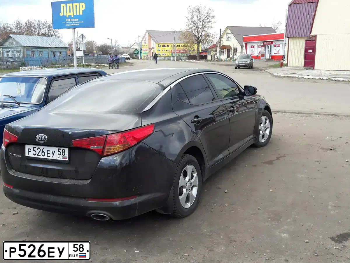 Фото автомобиля KIA MAGENTIS  OPTIMA, 2012 — госномер Р379ОЕ58. Цвет: ЧЕРНЫЙ