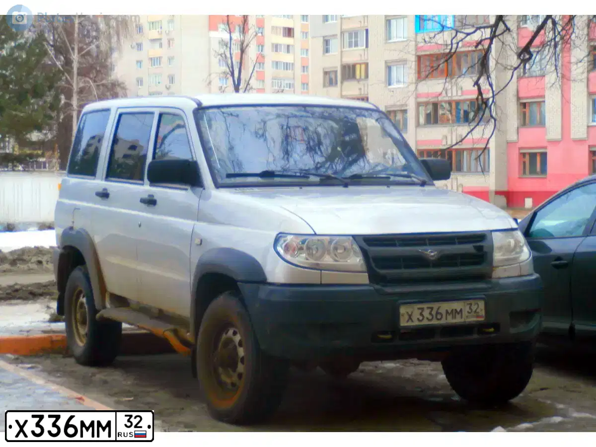 Фото автомобиля UAZ 3163 PATRIOT, 2008 — госномер Х336ММ32. Цвет: СНЕЖНАЯ КОРОЛЕВА
