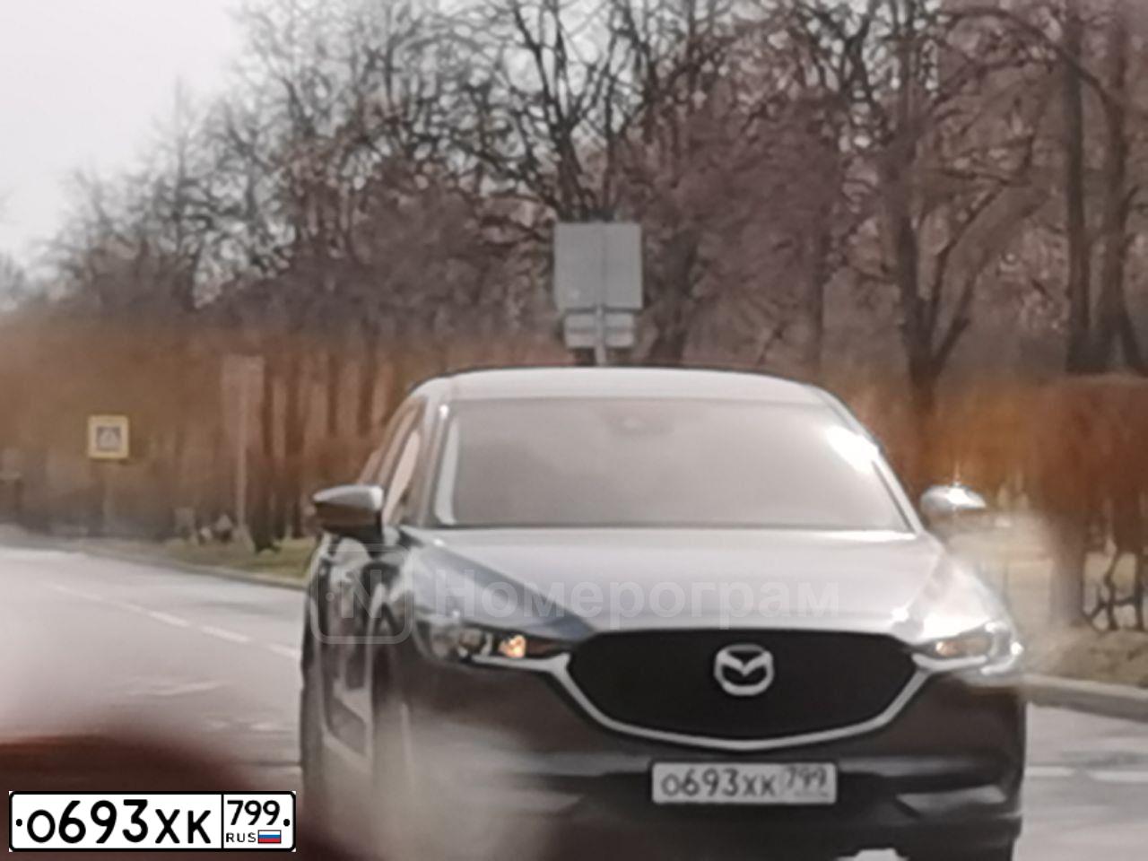Фото автомобиля MAZDA CX-5, 2020 — госномер Х974ЕС977. Цвет: СЕРЫЙ