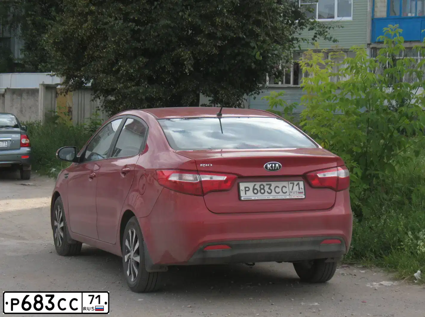 Фото автомобиля KIA RIO, 2013 — госномер Р683СС71. Цвет: КРАСНЫЙ