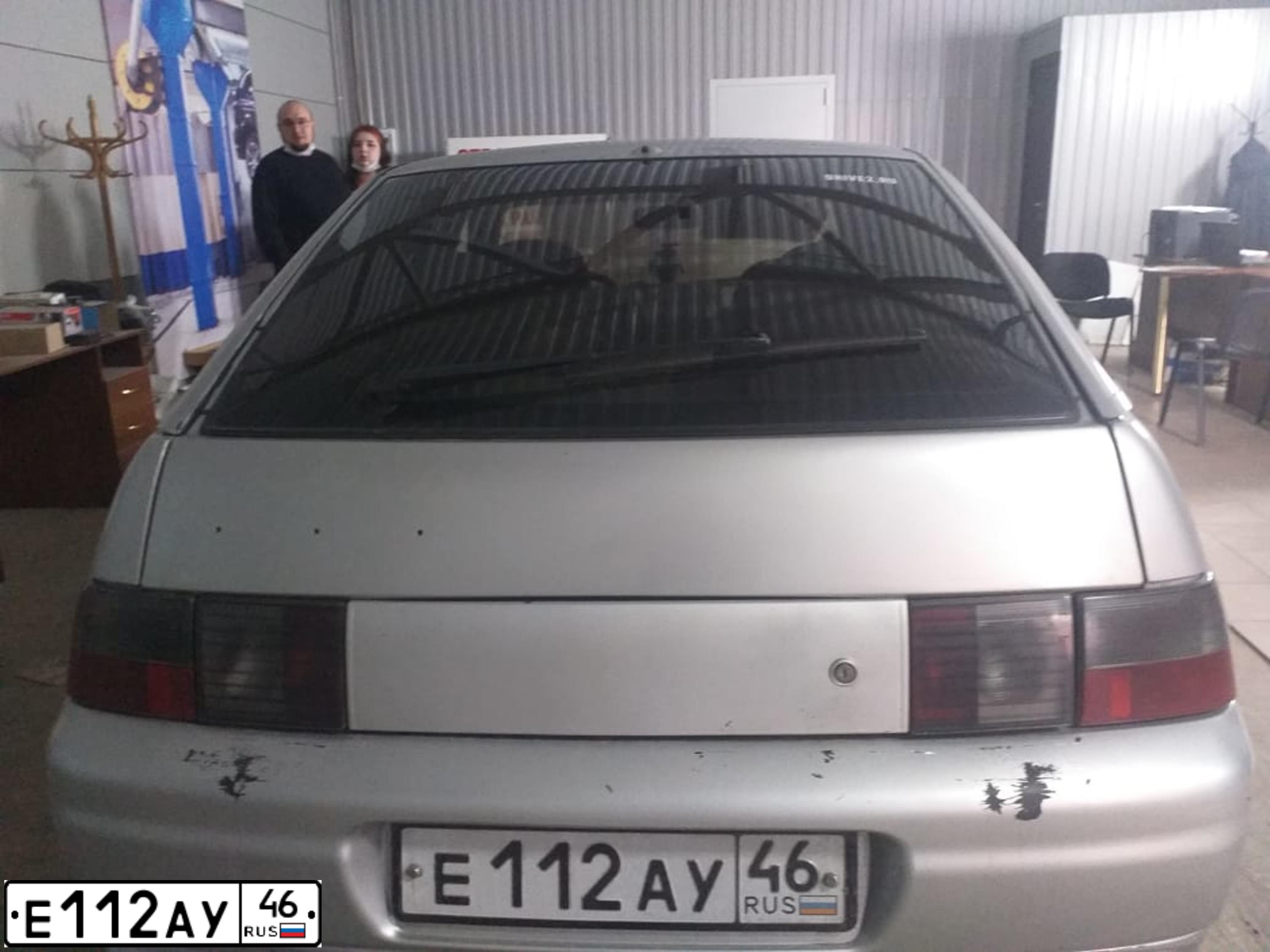 Фото автомобиля LADA 2112, 2001 — госномер Е112АУ46. Цвет: СВЕТЛО-СЕРЕБРИСТЫЙ  МЕТАЛЛИК