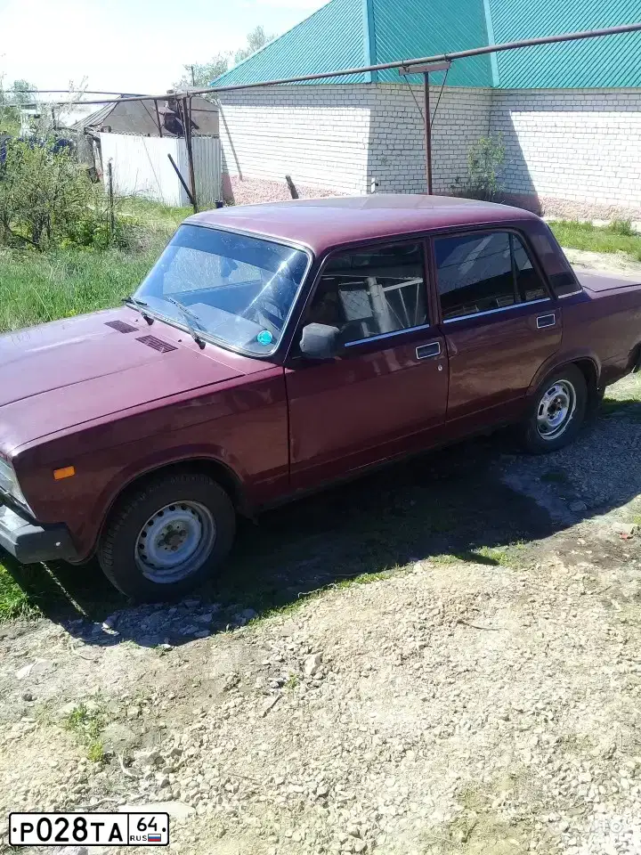 Фото автомобиля LADA 2107, 2004 — госномер Р653РК64. Цвет: ТЕМНО БОРДОВЫЙ