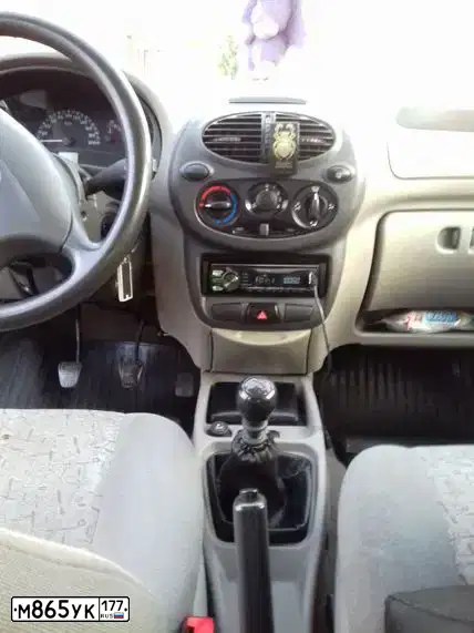 Фото автомобиля LADA 1118 KALINA, 2007 — госномер К822АР82. Цвет: БЕЛО-ЖЕЛТЫЙ