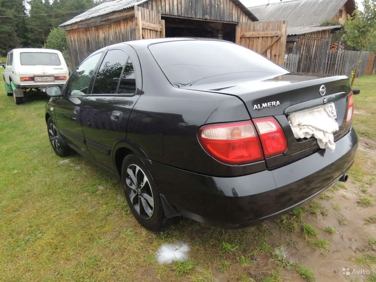 Фото автомобиля NISSAN ALMERA, 2007 — госномер К109СК21. Цвет: ЧЕРНЫЙ