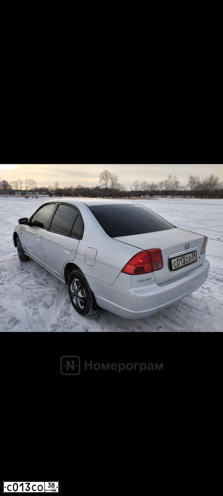 Фото автомобиля HONDA CIVIC FERIO, 2002 — госномер Т200НВ138