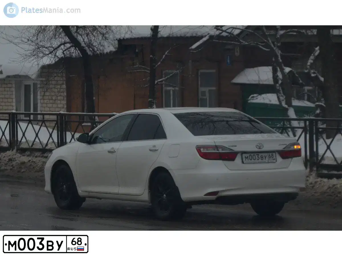 Фото автомобиля FORD FOCUS, 2010 — госномер М003ВУ68. Цвет: ЧЕРНЫЙ
