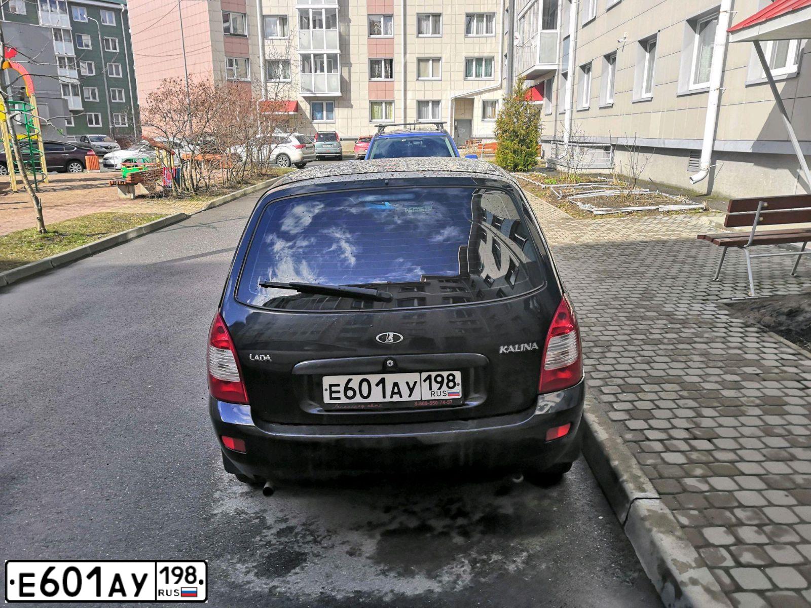 Фото автомобиля LADA 1117 KALINA, 2010 — госномер Е601АУ198. Цвет: ЧЕРНЫЙ