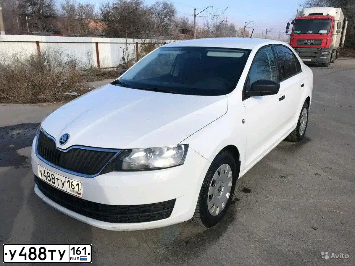 Фото автомобиля SKODA RAPID, 2015 — госномер М459РМ777. Цвет: Белый