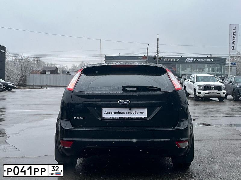 Фото автомобиля FORD FOCUS, 2010 — госномер Т973РЕ71. Цвет: ЧЕРНЫЙ