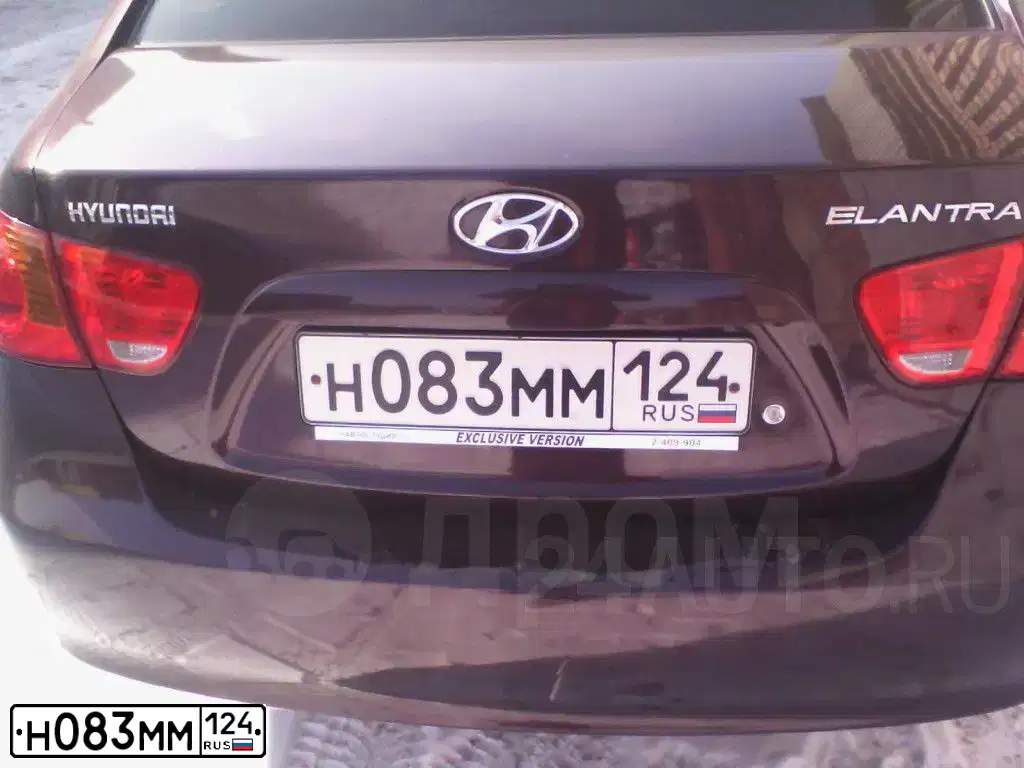 Фото автомобиля HYUNDAI ELANTRA, 2009 — госномер Н083ММ124. Цвет: КРАСНЫЙ