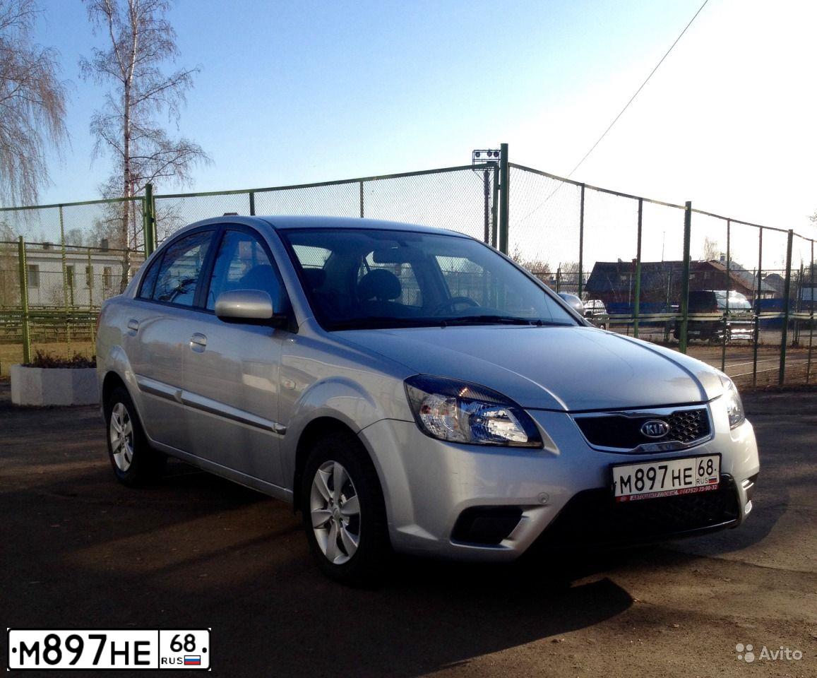 Фото автомобиля KIA RIO, 2010 — госномер О116АУ68. Цвет: серебристый
