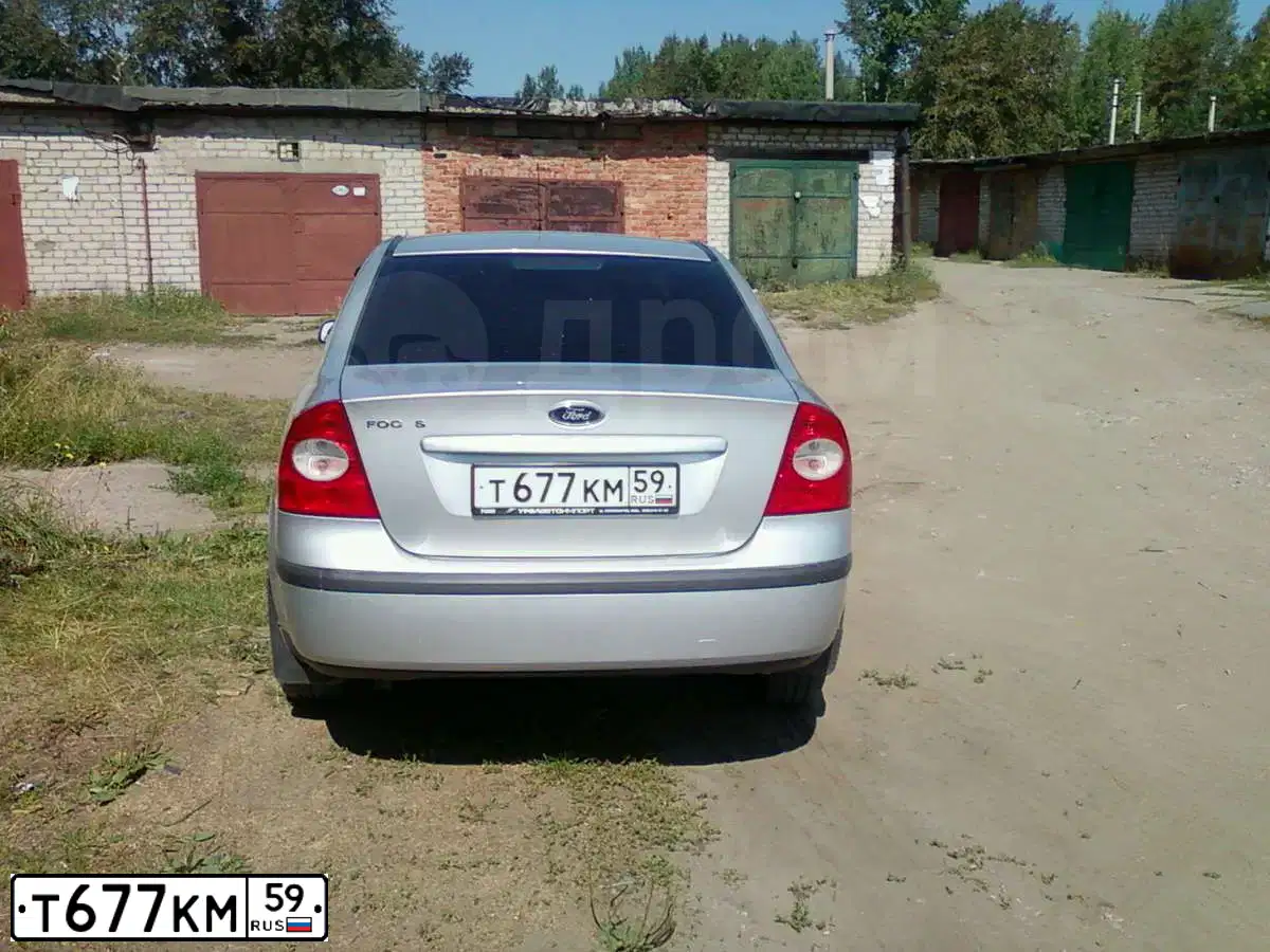 Фото автомобиля FORD FOCUS, 2007 — госномер Т677КМ59. Цвет: СЕРЕБРИСТЫЙ