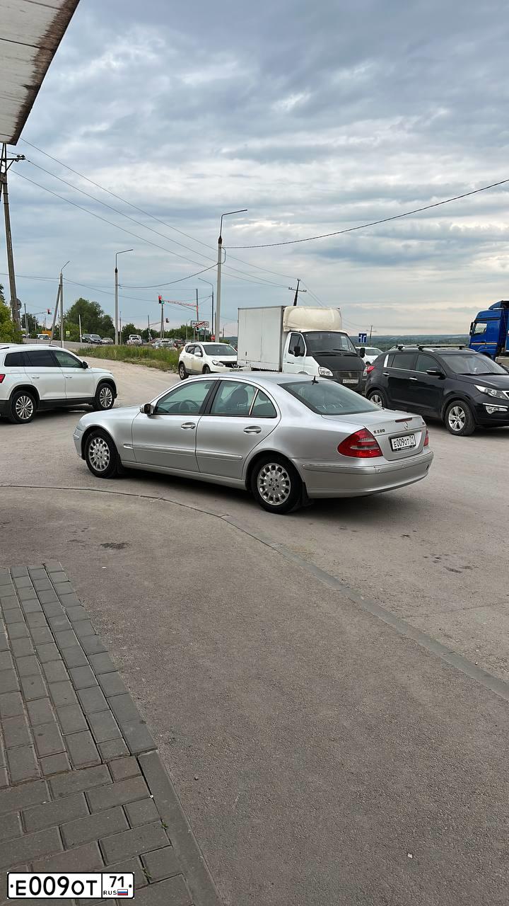 Фото автомобиля VOLKSWAGEN TOUAREG, 2006 — госномер Е094ХР790. Цвет: ЧЕРНЫЙ