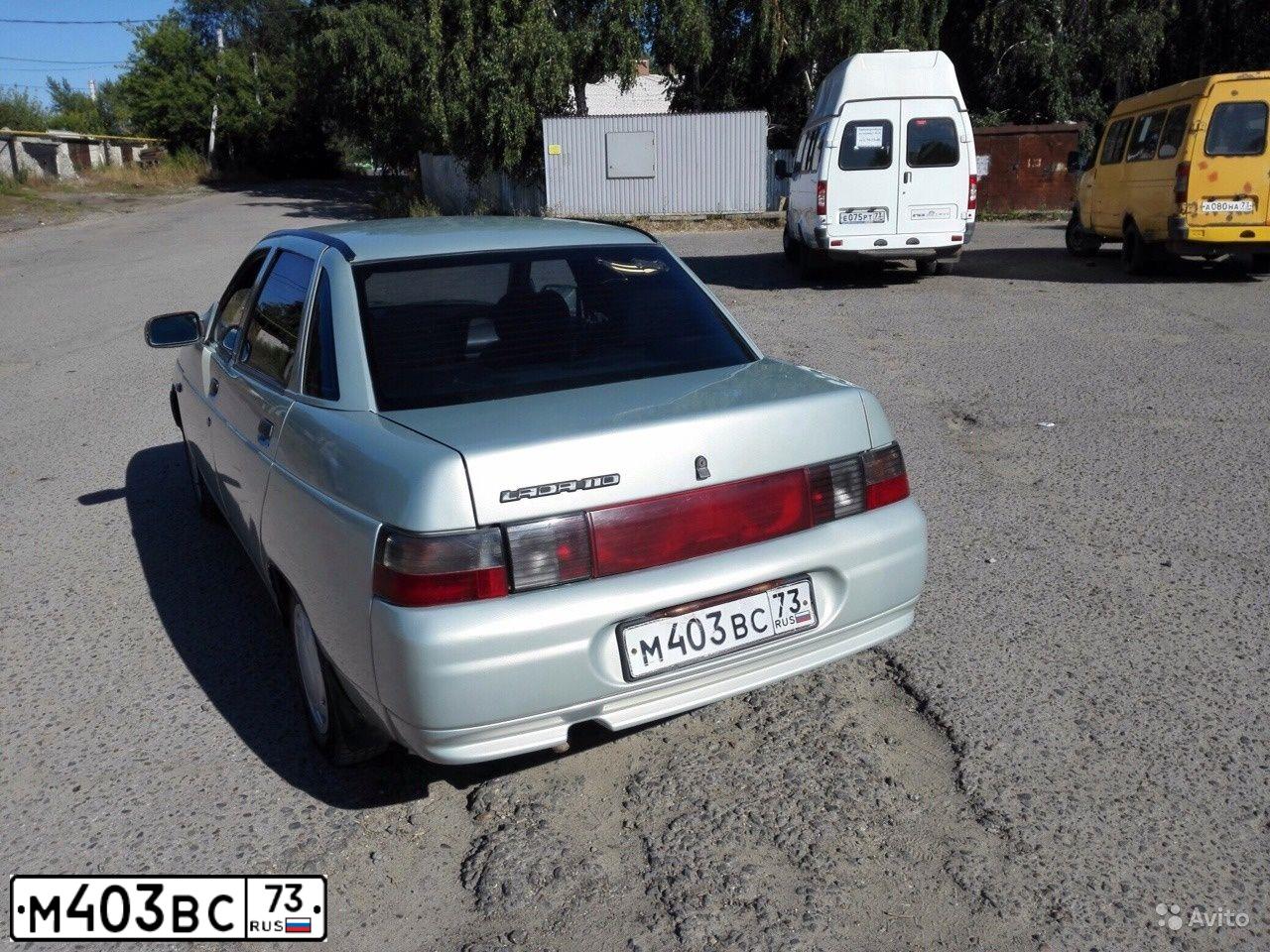 Фото автомобиля LADA 2110, 2002 — госномер М403ВС73. Цвет: СЕРЕБРИСТЫЙ ЖЕЛТО-ЗЕЛЕНЫЙ