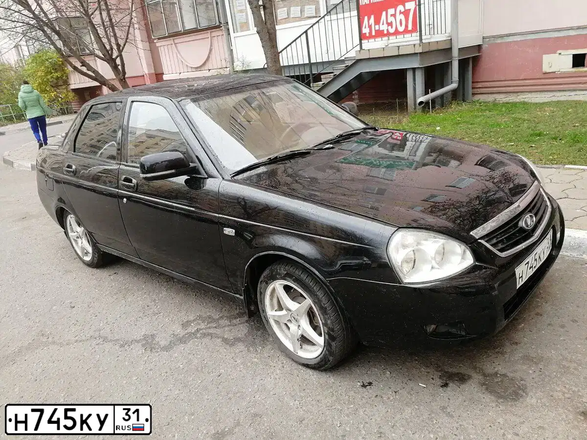 Фото автомобиля LADA 2170 PRIORA, 2013 — госномер Н745КУ31. Цвет: СИНЕ-ЧЕРНЫЙ