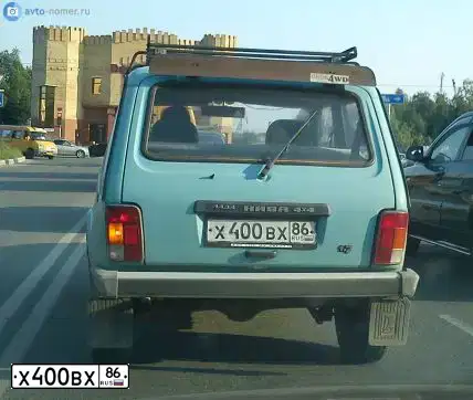 Фото автомобиля KIA SPORTAGE, 2004 — госномер Т446АС774. Цвет: Серебристый