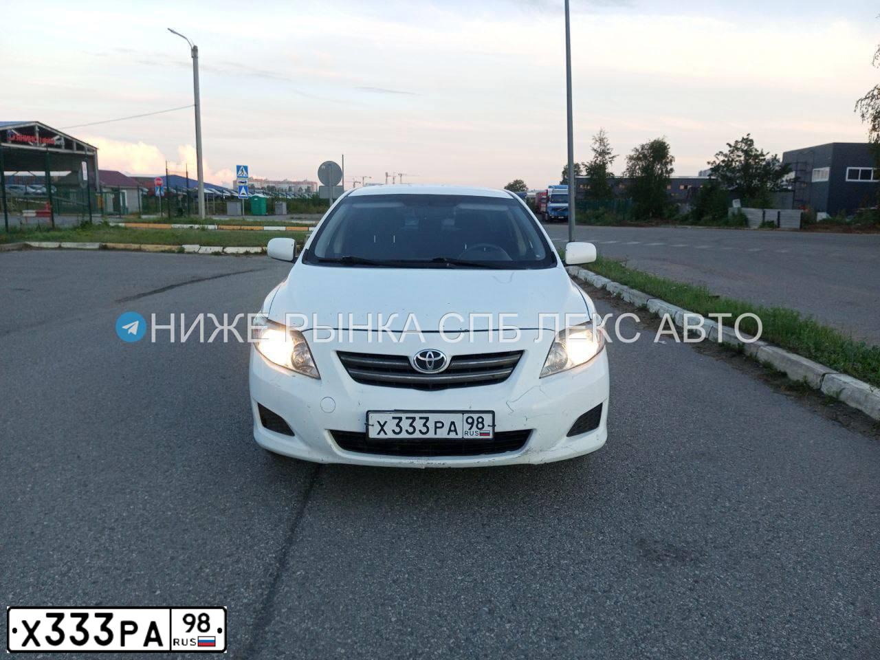 Фото автомобиля TOYOTA COROLLA, 2007 — госномер Т974НР39. Цвет: Белый