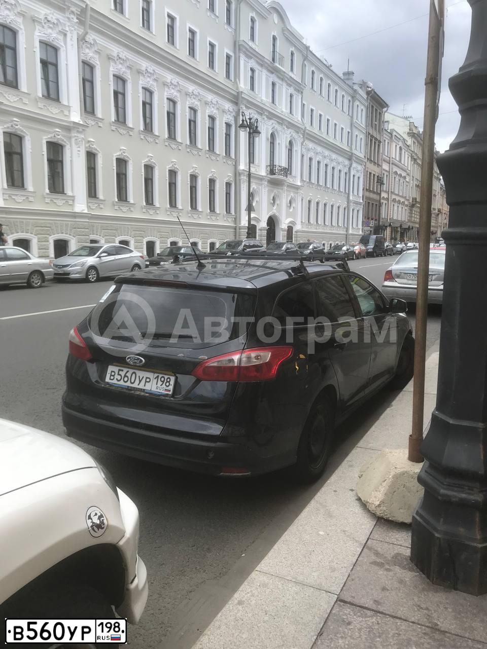 Фото автомобиля FORD FOCUS, 2012 — госномер В560УР198. Цвет: ЧЕРНЫЙ