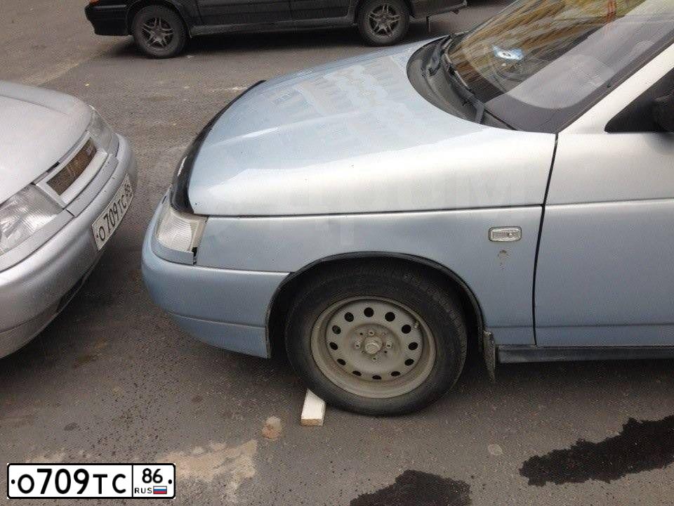 Фото автомобиля LADA 2112, 2007 — госномер Е503РУ86. Цвет: СЕРЫЙ
