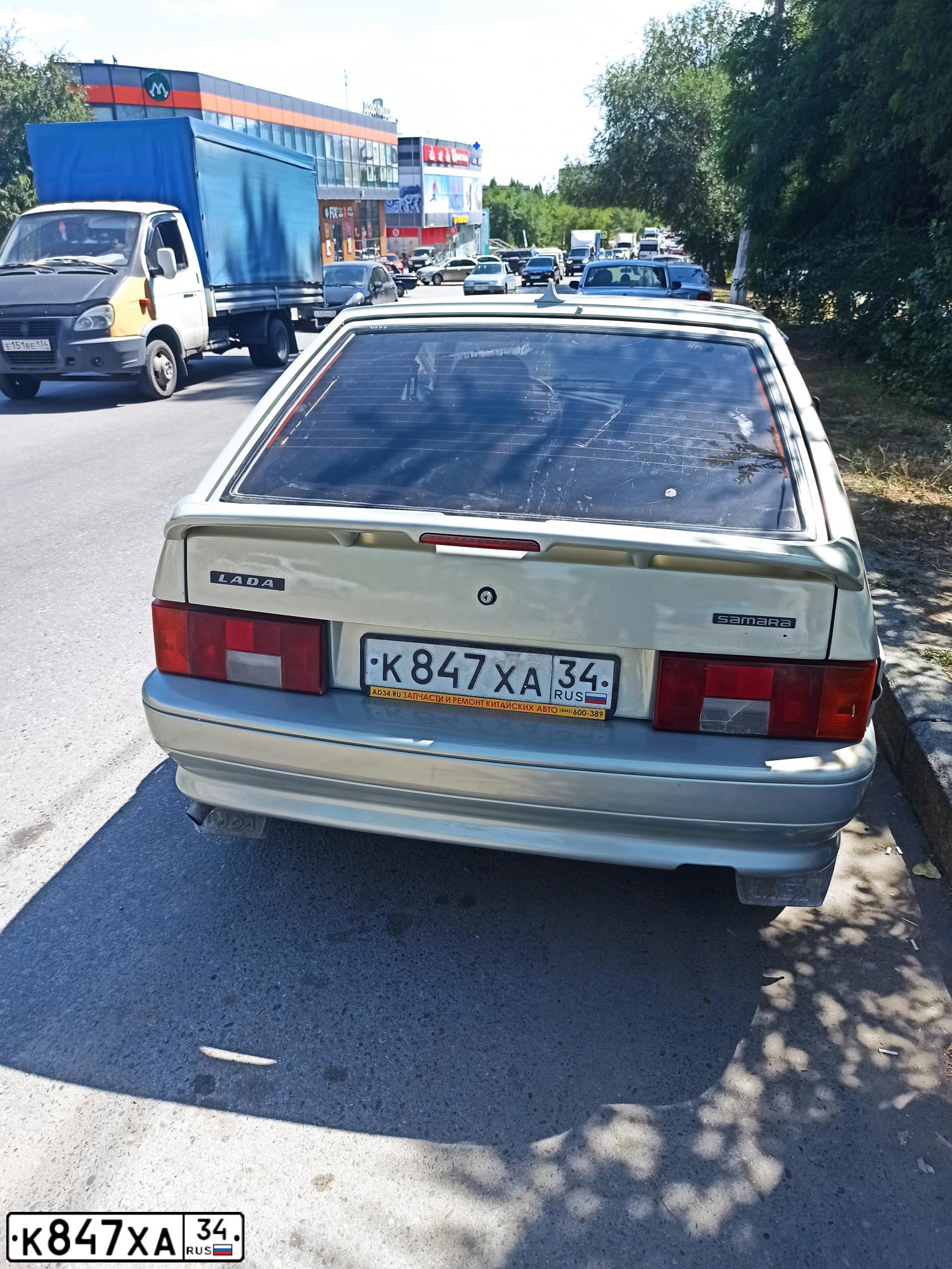 Фото автомобиля LADA 2114, 2006 — госномер Е556КМ761. Цвет: МОЛОЧНО-БЕЛЫЙ СЕРЕБРИСТЫЙ