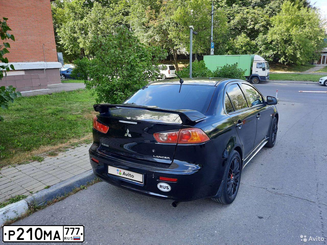 Фото автомобиля NISSAN PATHFINDER, 2014 — госномер Р210МА777. Цвет: ЧЕРНЫЙ