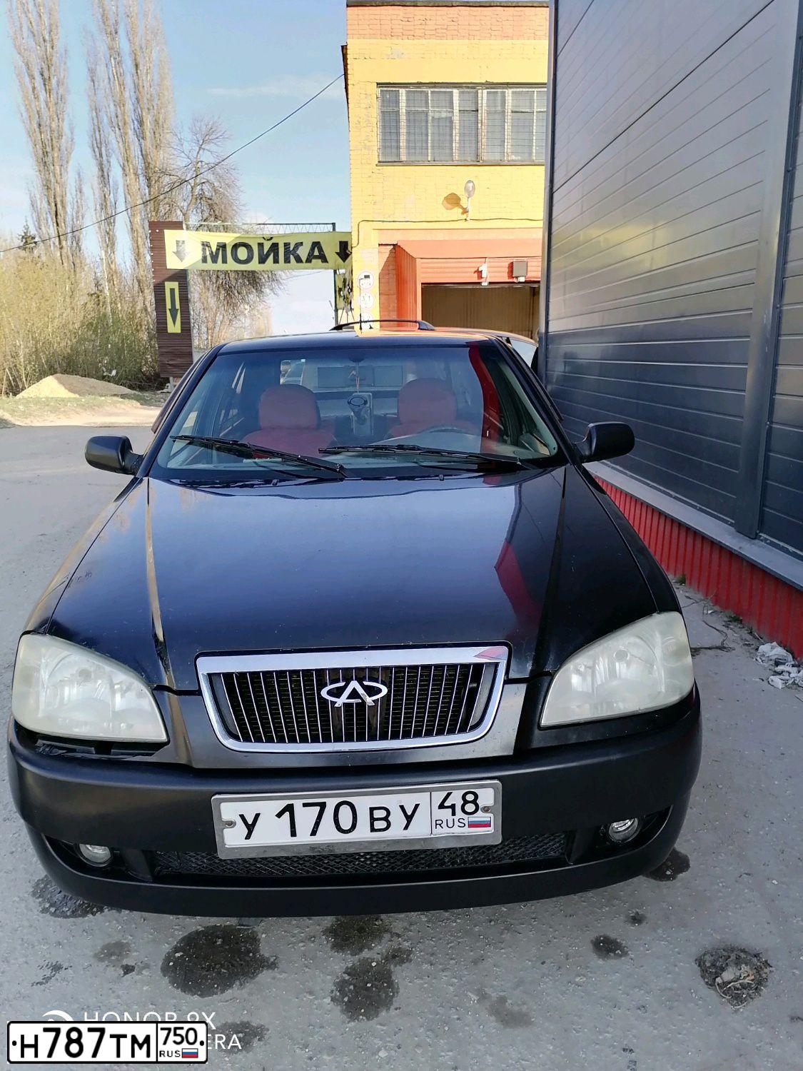 Фото автомобиля CHERY AMULET /FLAGCLOUD/, 2006 — госномер У170ОВ48. Цвет: ЧЕРНЫЙ