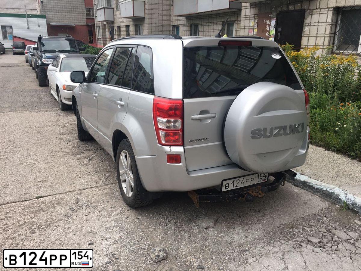 Фото автомобиля SUZUKI /GRAND/ VITARA, 2007 — госномер Е753ЕН138. Цвет: СЕРЕБРИСТЫЙ