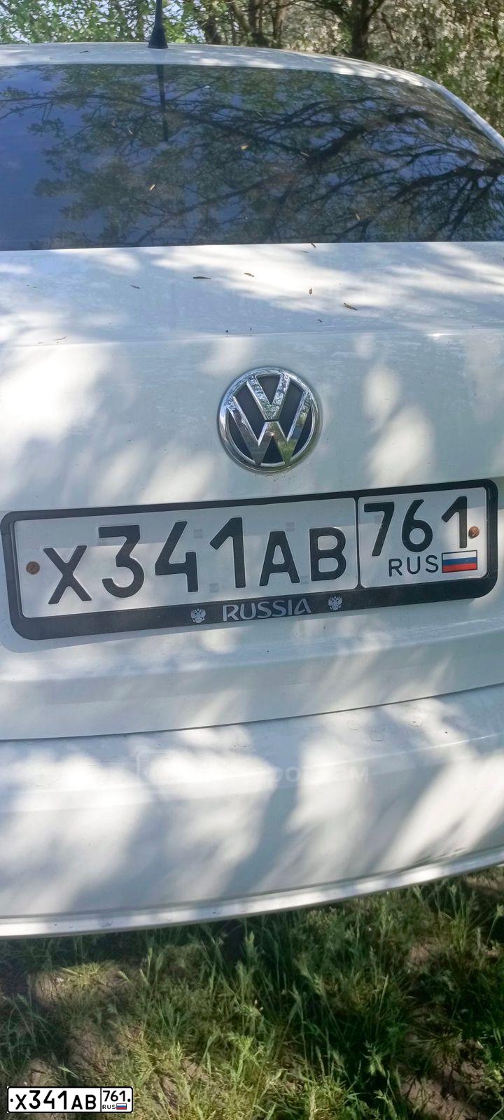 Фото автомобиля VOLKSWAGEN POLO, 2014 — госномер Х341АВ761. Цвет: Белый