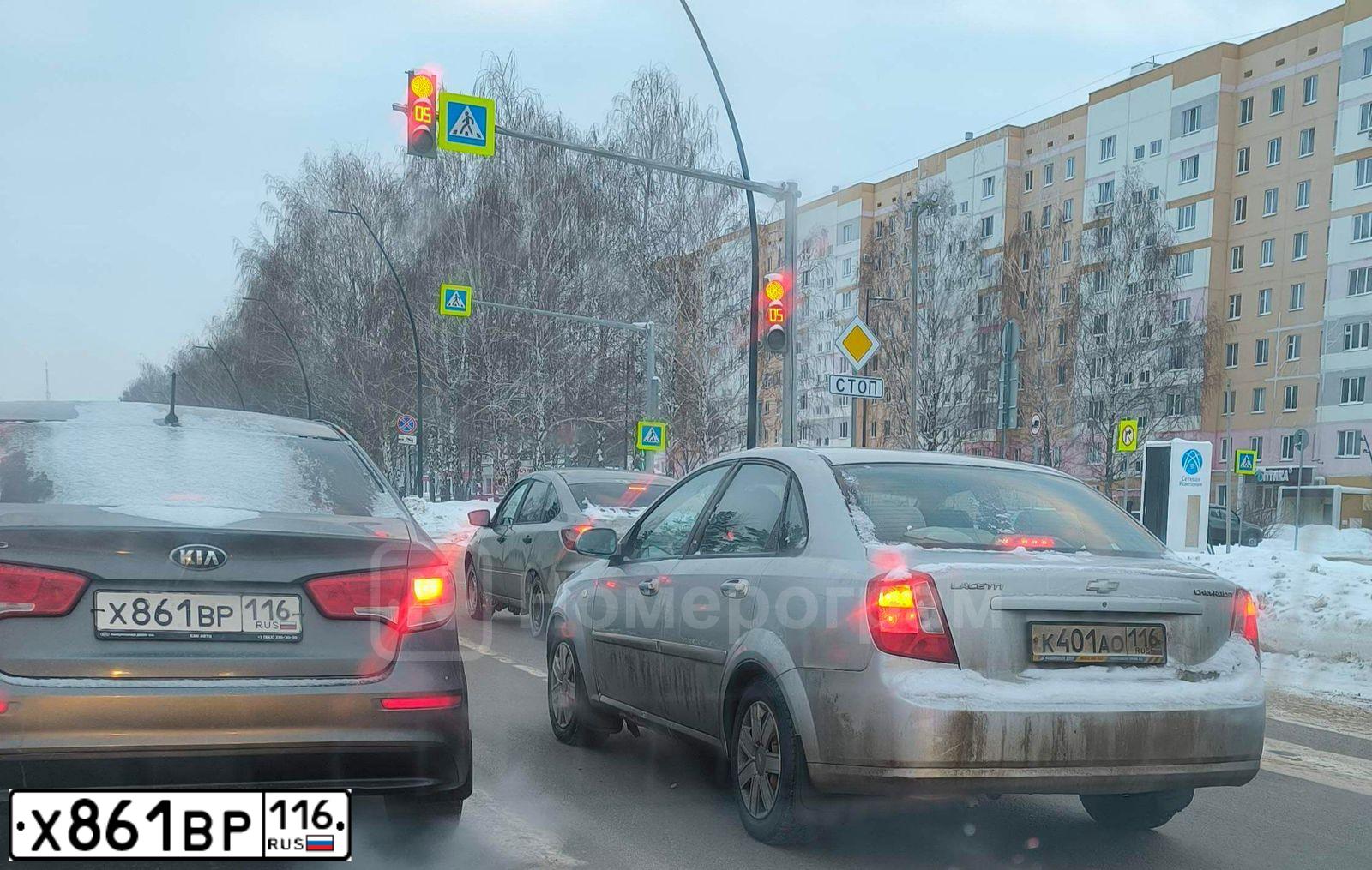 Фото автомобиля KIA RIO, 2015 — госномер Х861ВР116. Цвет: ТЕМНО-СЕРЫЙ