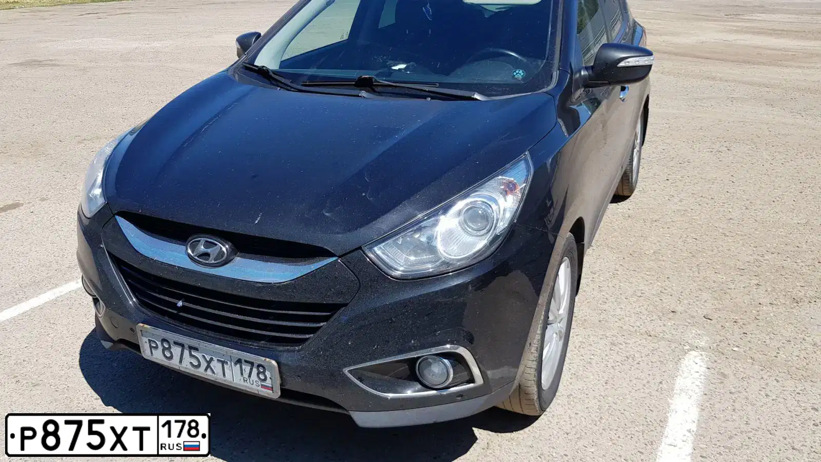 Фото автомобиля HYUNDAI IX35, 2012 — госномер М011КМ196. Цвет: ЧЕРНЫЙ