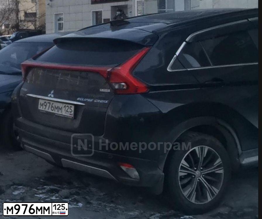 Фото автомобиля MITSUBISHI ECLIPSE CROSS, 2018 — госномер М976ММ125. Цвет: ЧЕРНЫЙ