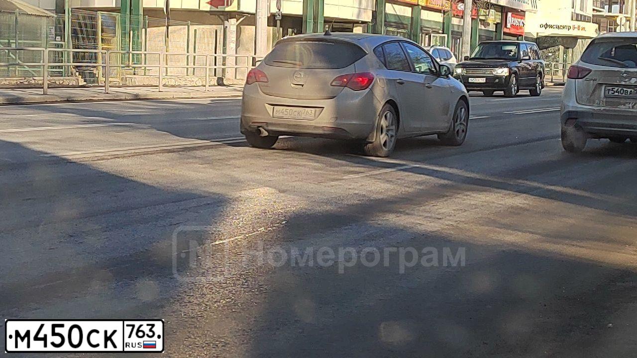 Фото автомобиля OPEL ASTRA, 2012 — госномер М450СК763. Цвет: БЕЖЕВЫЙ МЕТАЛЛИК