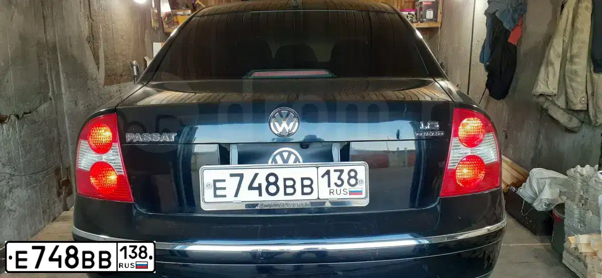Фото автомобиля VOLKSWAGEN PASSAT, 2002 — госномер М246КС138. Цвет: ЧЕРНЫЙ