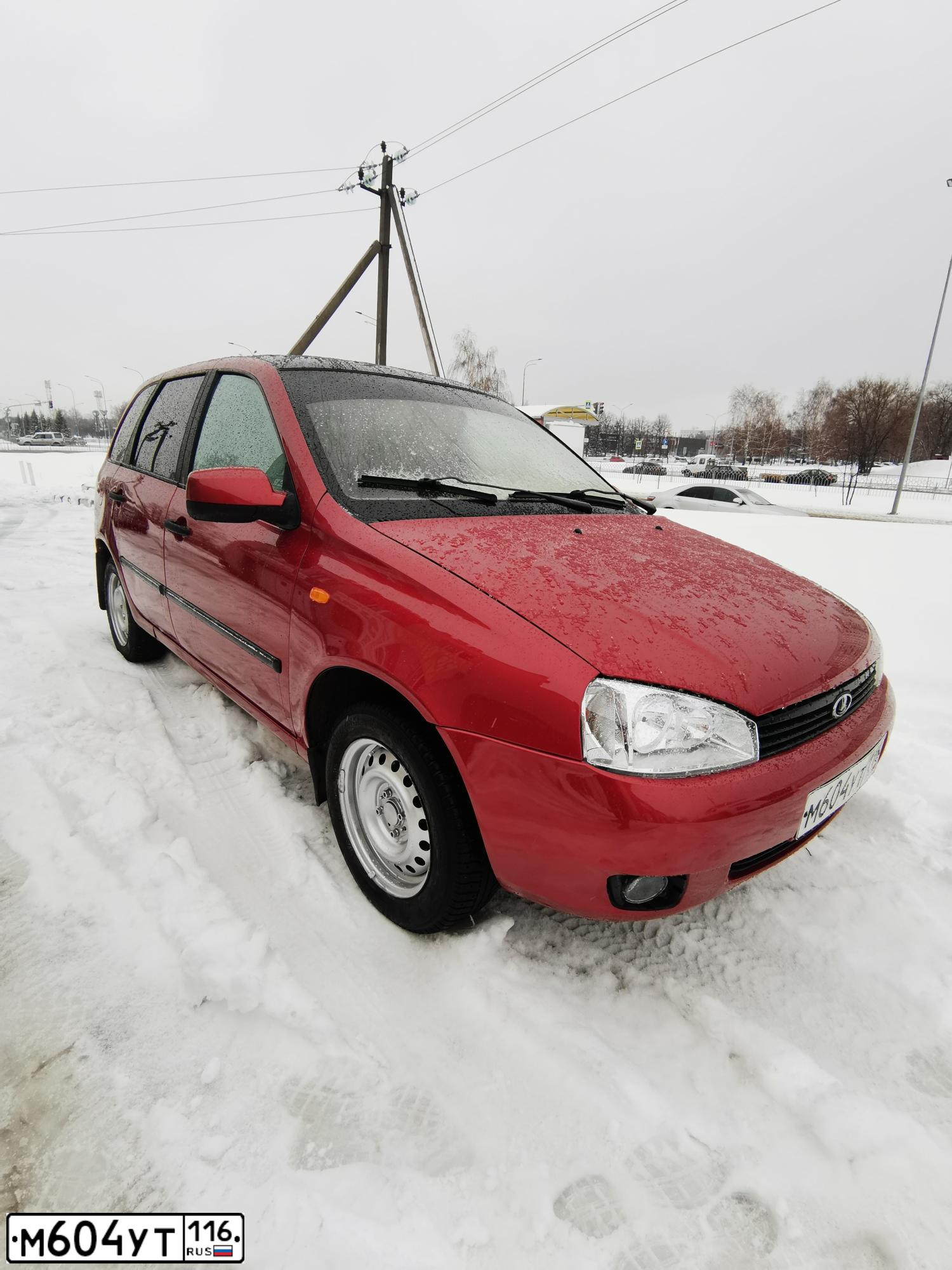 Фото автомобиля LADA 1117 KALINA, 2009 — госномер М604УТ116. Цвет: СЕРЕБРИСТО-КРАСНЫЙ