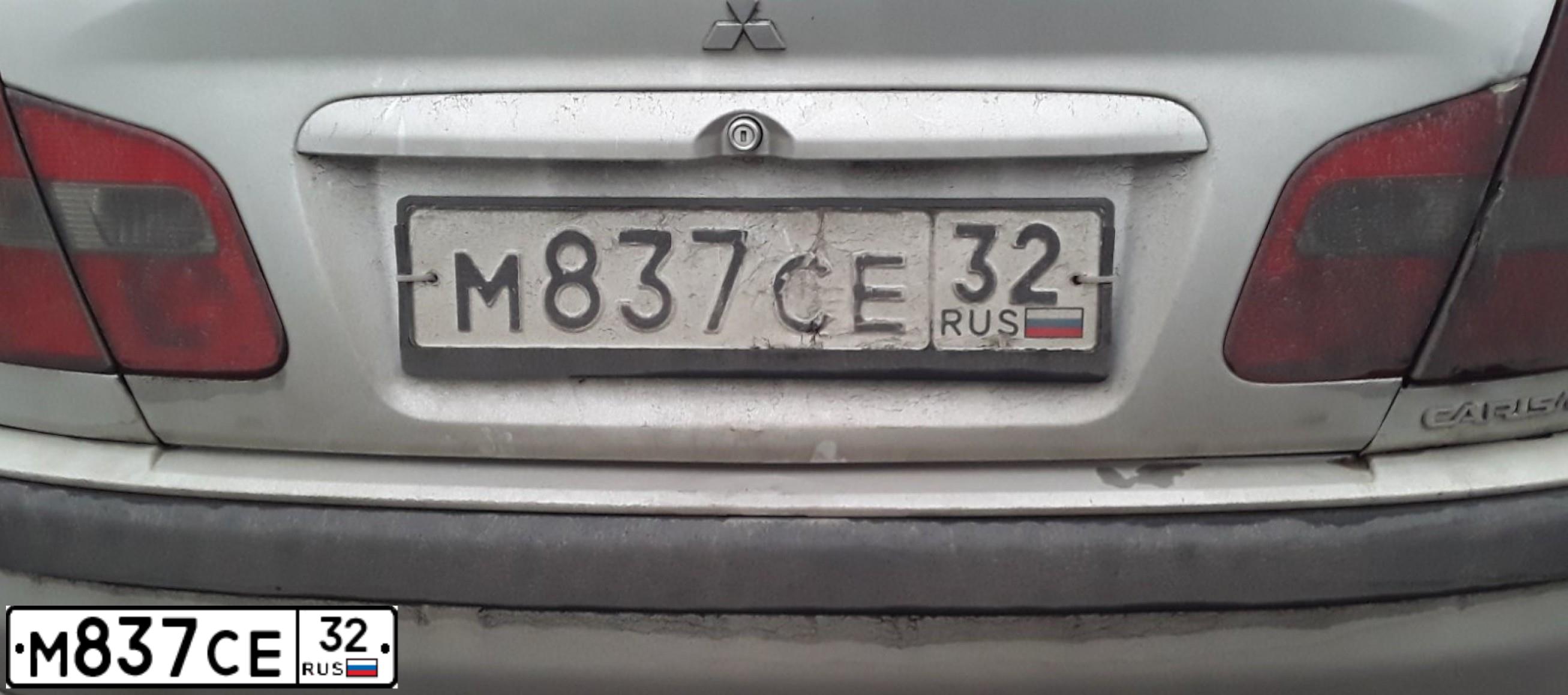 Фото автомобиля MITSUBISHI CARISMA, 2002 — госномер Р152ЕВ40. Цвет: Серебристый