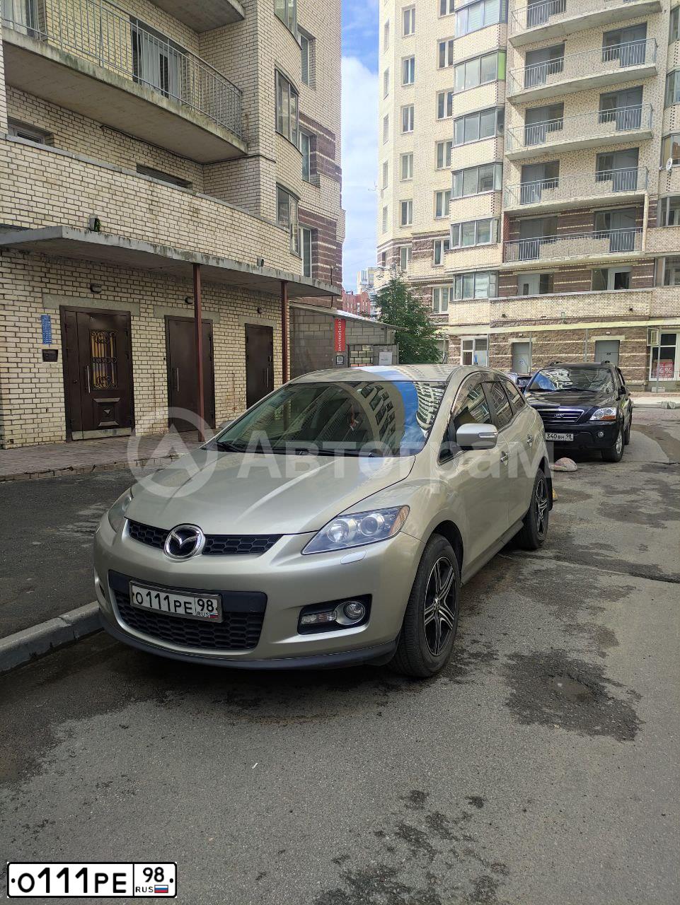 Фото автомобиля MAZDA CX-7, 2008 — госномер О111РЕ98. Цвет: СЕРЕБРИСТЫЙ