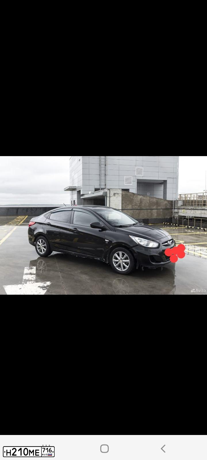 Фото автомобиля HYUNDAI SOLARIS, 2011 — госномер Н210МЕ716. Цвет: ЧЕРНЫЙ