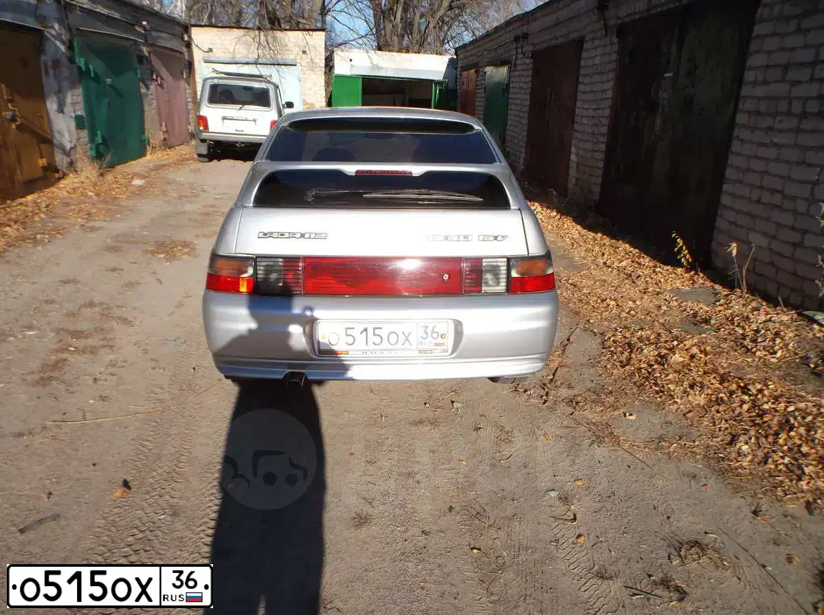 Фото автомобиля LADA 2112, 2004 — госномер О515ОХ36. Цвет: СВЕТЛО-СЕРЕБРИСТЫЙ МЕТАЛЛ