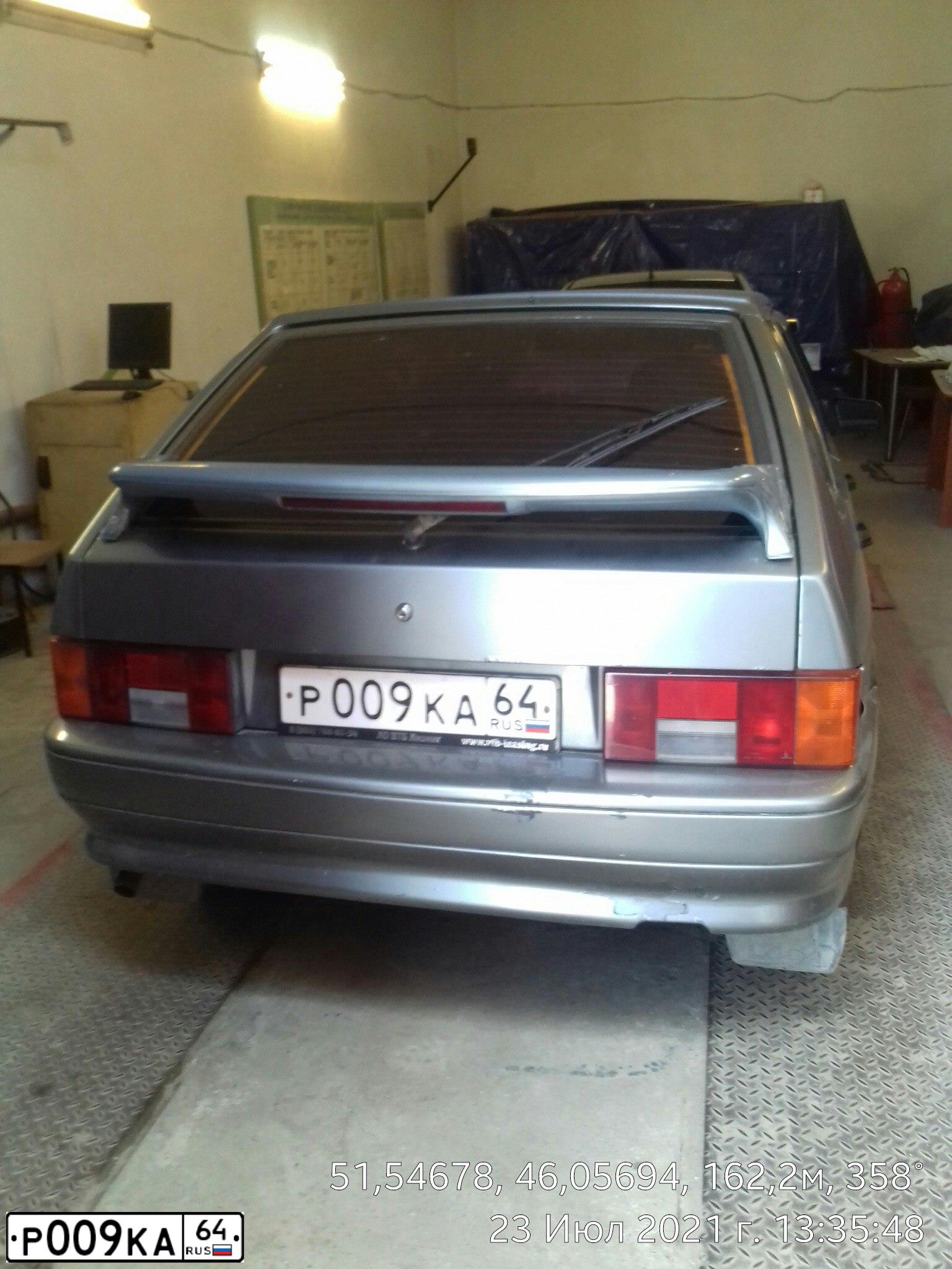 Фото автомобиля LADA 2114 SAMARA, 2009 — госномер Р009КА64. Цвет: СЕРО ЗЕЛЕНЫЙ